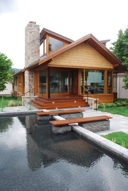 Фото экстерьера загородного дома с бассейном.