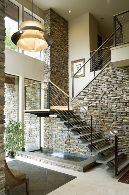 Фотография современной лестницы для модернизированного помещения.